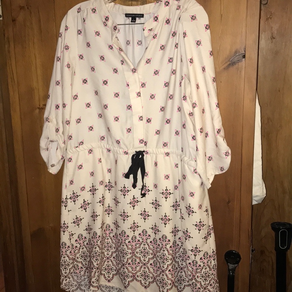 3/4 length cream dress with pattern